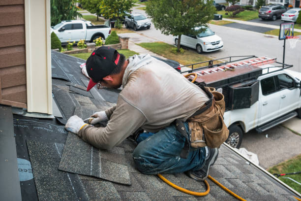 Professional Roofing technician working in New River, VA